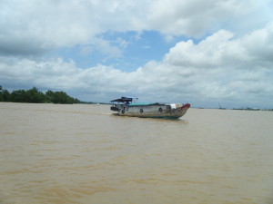 A traditional Mekong Delta boat, complete with decorative eyes at the bow to ward off spirits. 